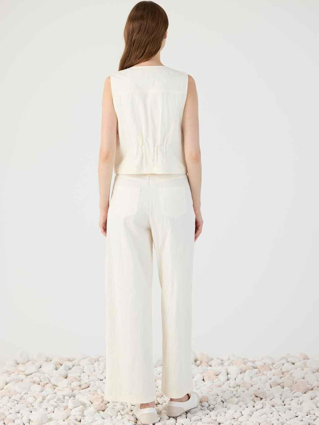 Eleh gilet panna con taschini