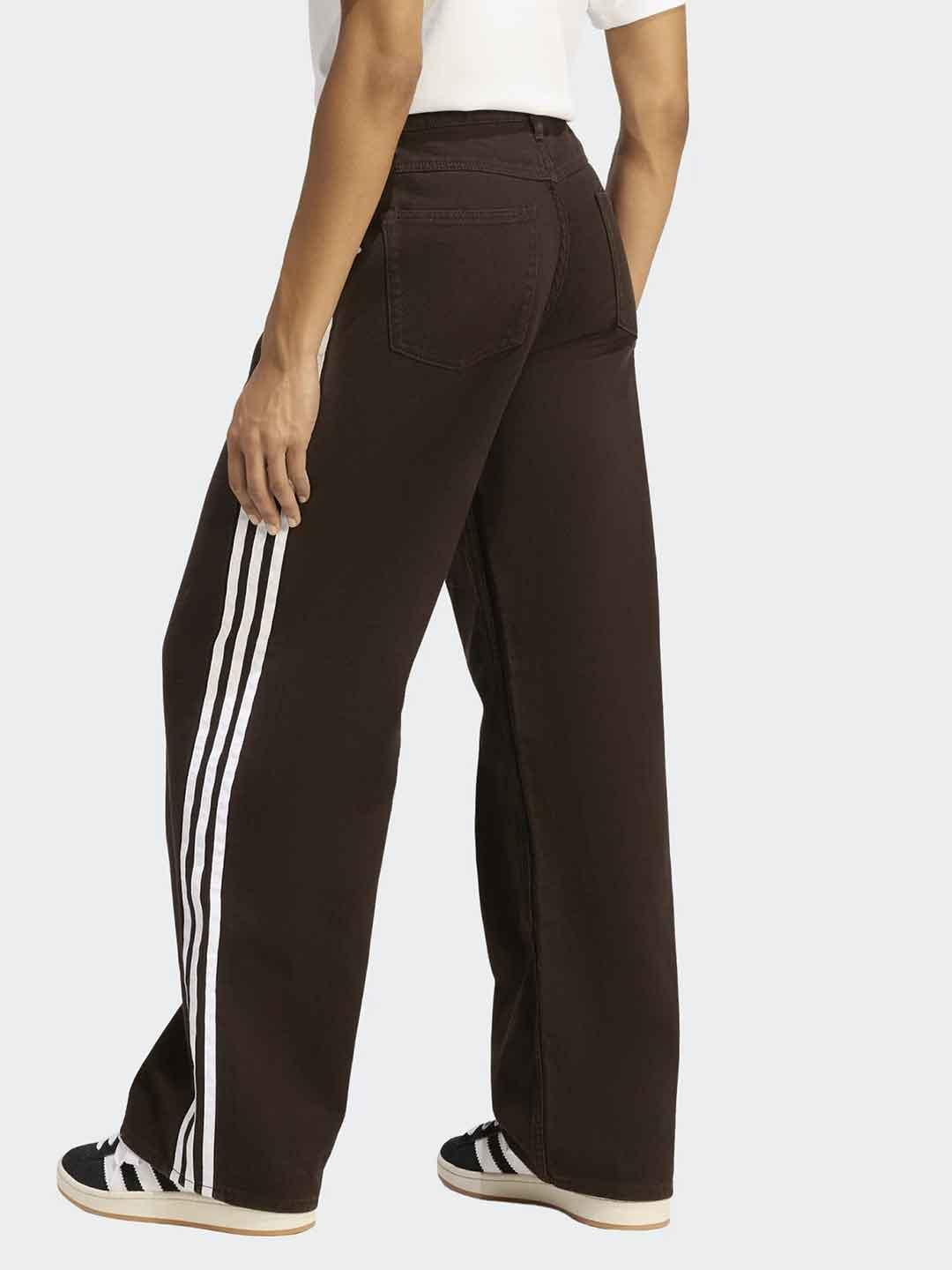 Adidas jeans marorne con bande bianche