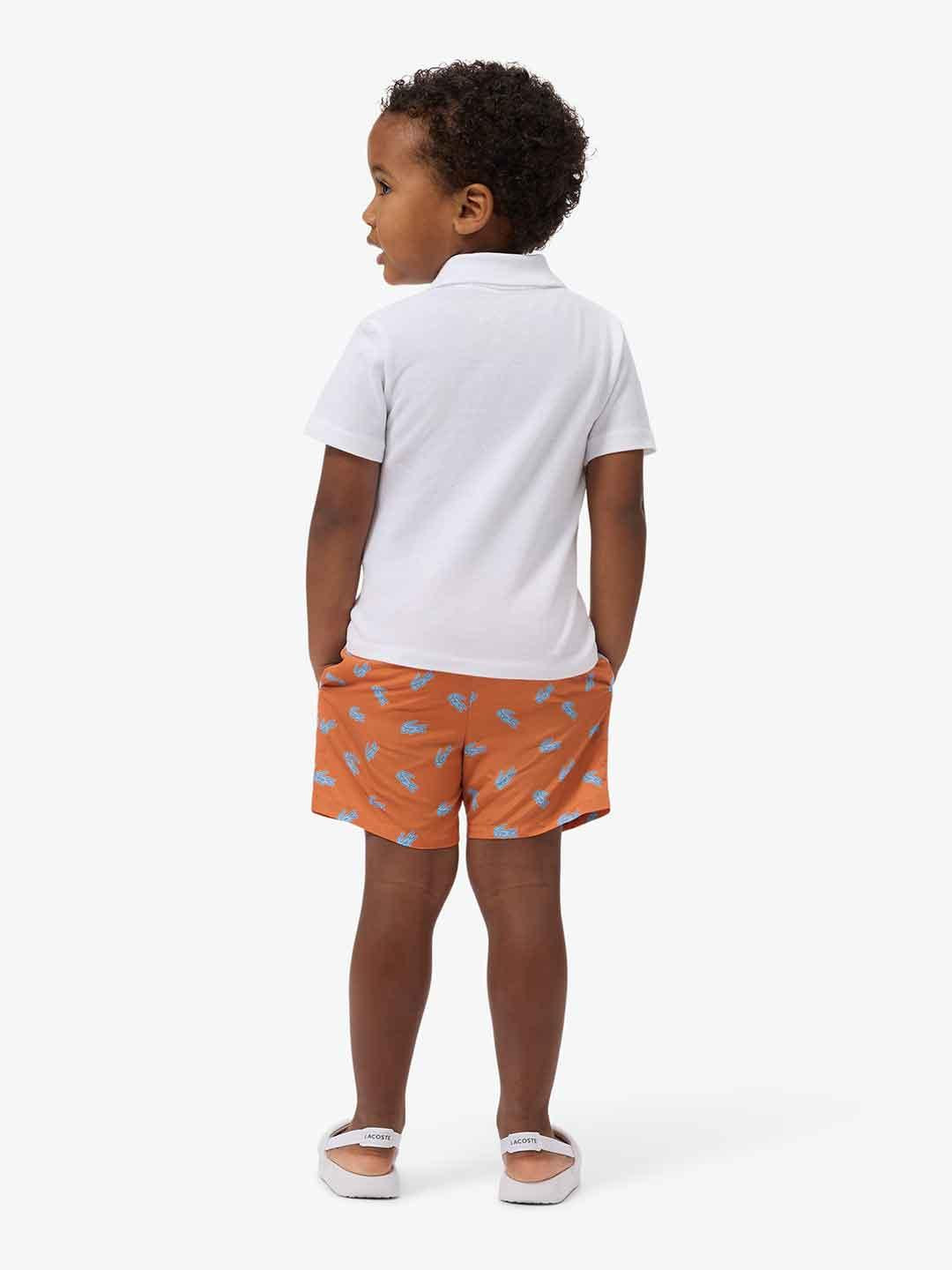 Lacoste costume kids arancio con logo celeste