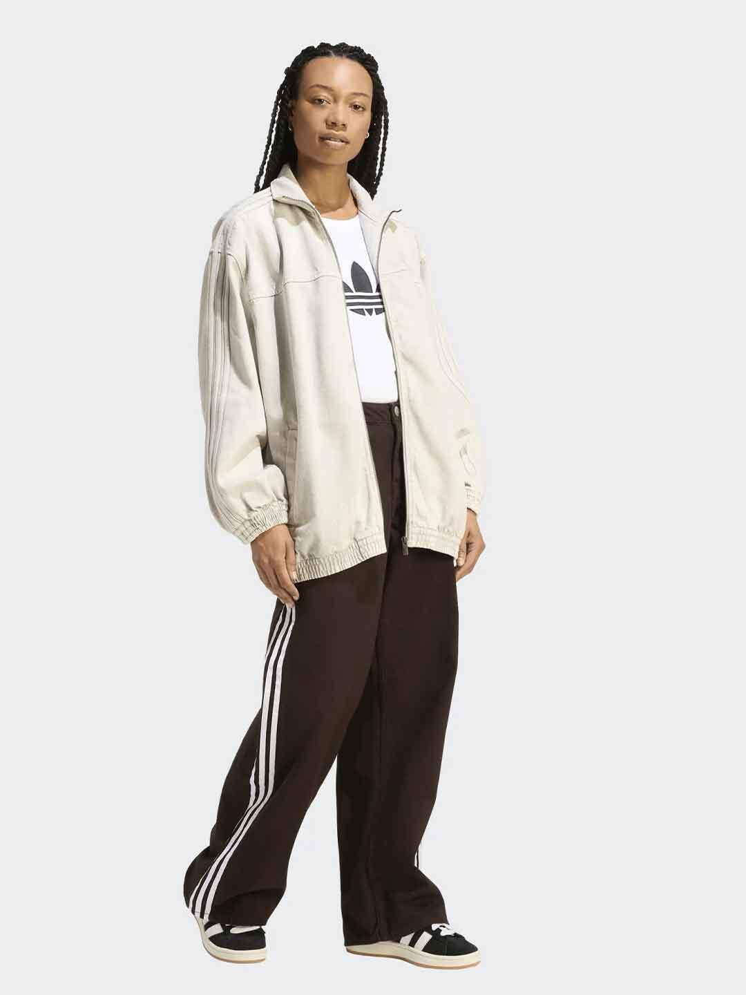 Adidas jeans marorne con bande bianche