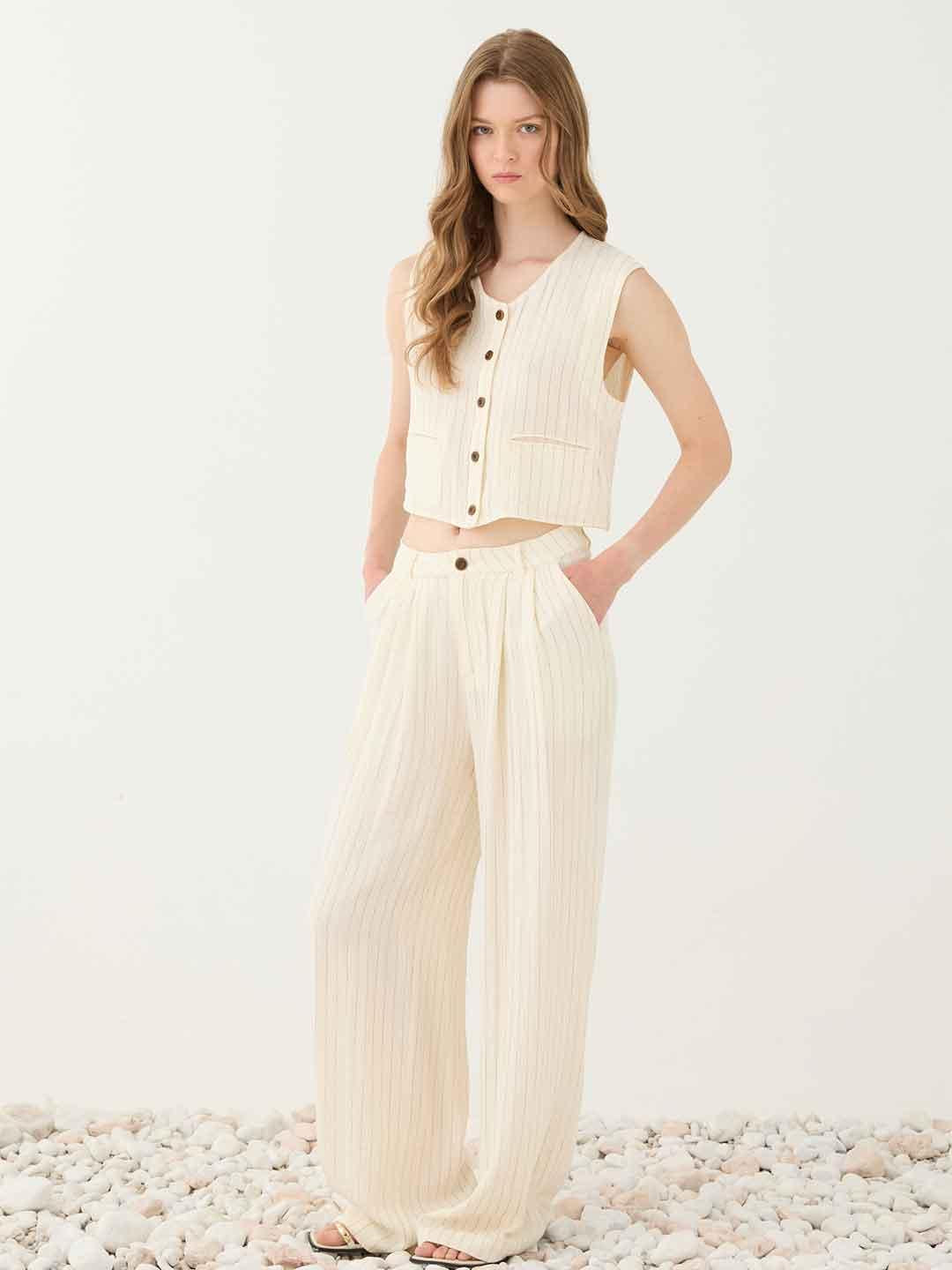 Eleh pantaloni panna con righe nere