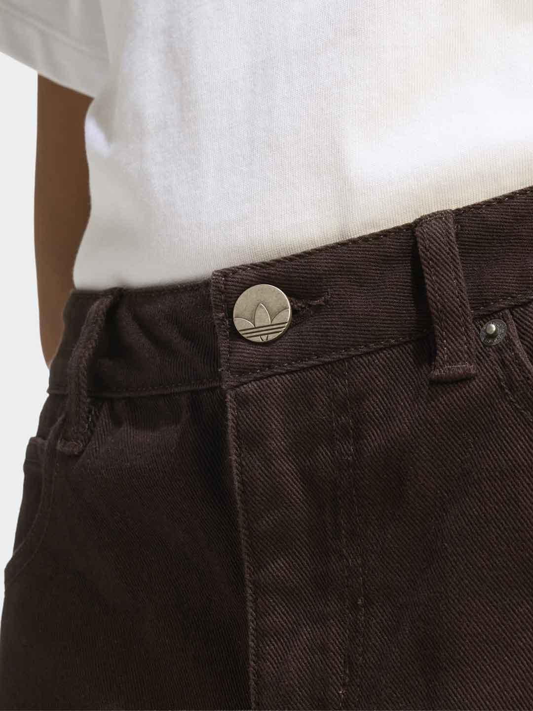 Adidas jeans marorne con bande bianche