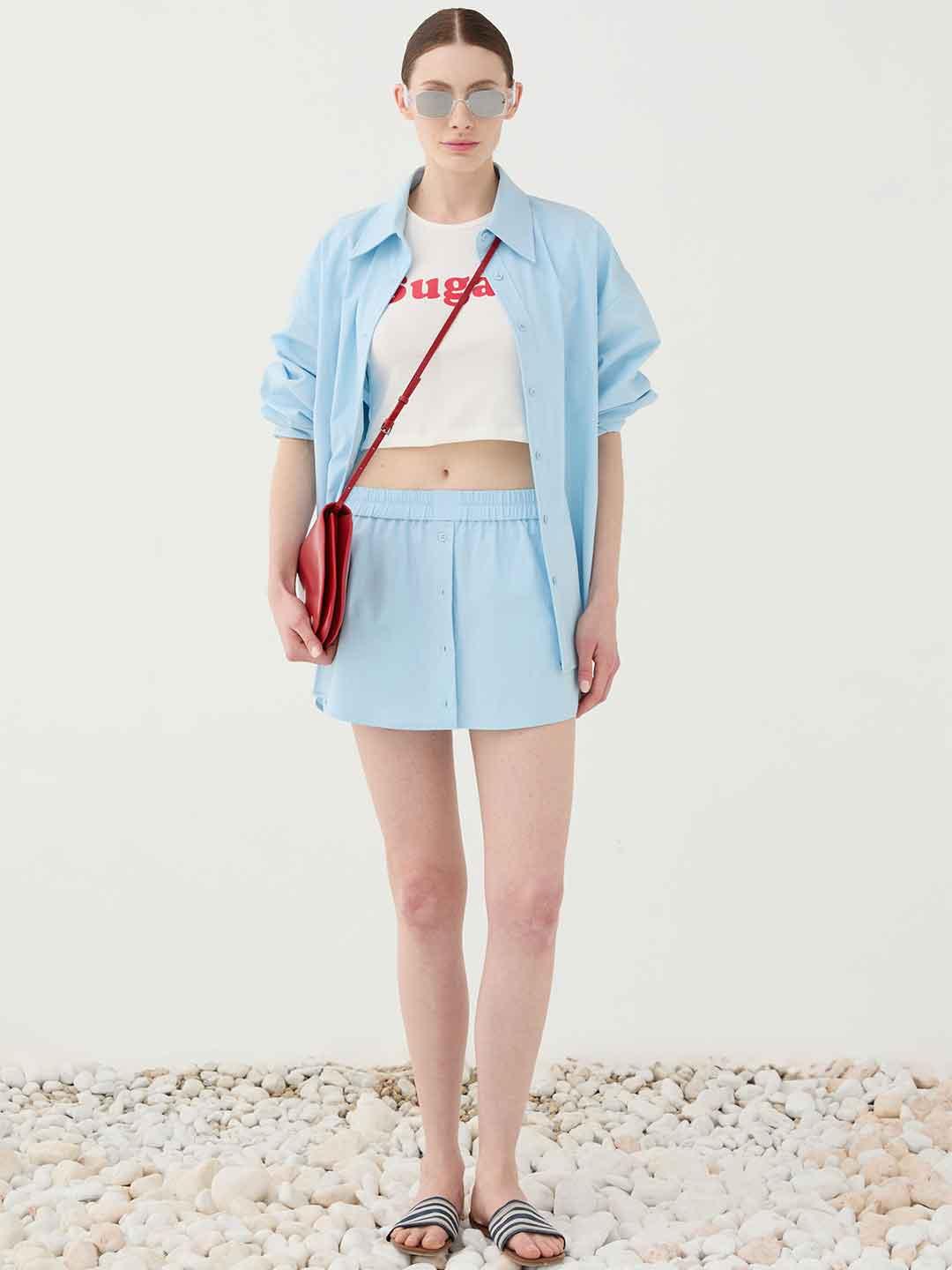 Eleh camicia celeste con ricamo sul retro