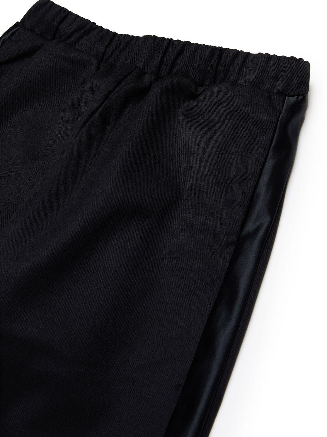Maison Margiela pantaloni kids nero e beige