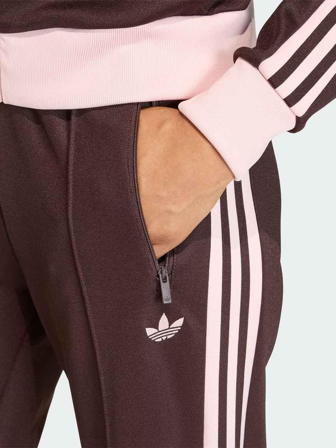 Adidas pantaloni marrone con bande rosa