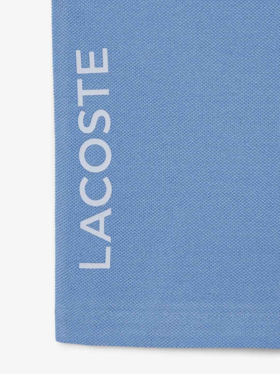 Lacoste t-shirt kids azzurro con banda celeste