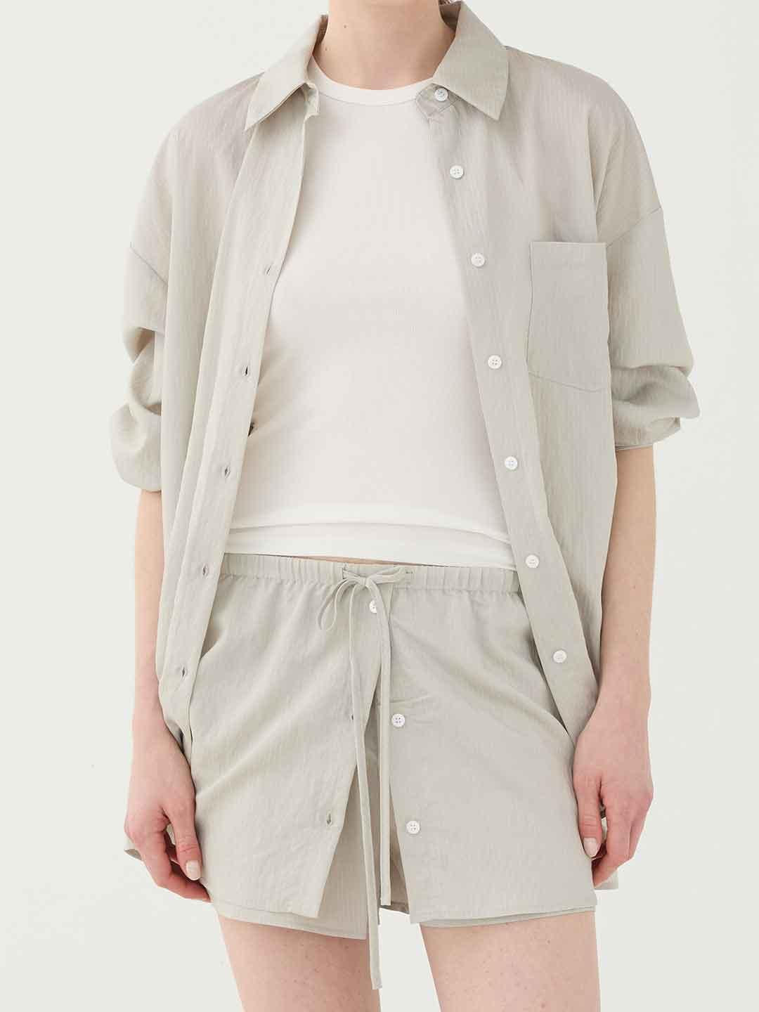 Eleh shorts beige con righe bianche