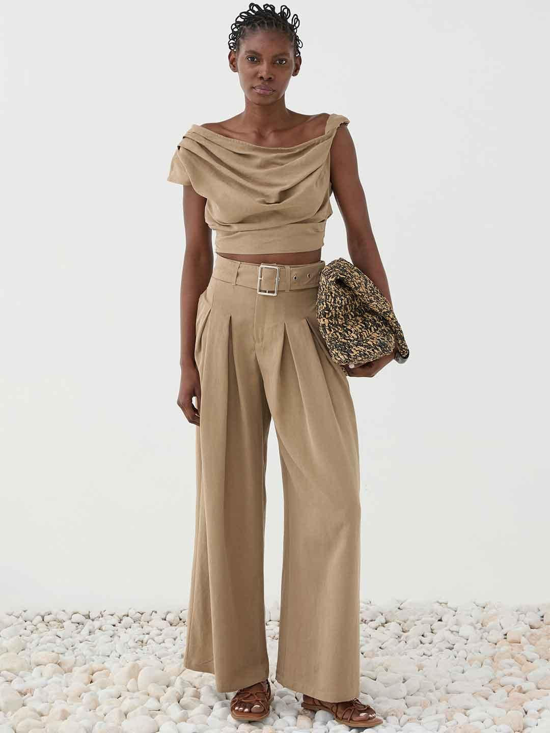 Eleh pantaloni beige con cintura
