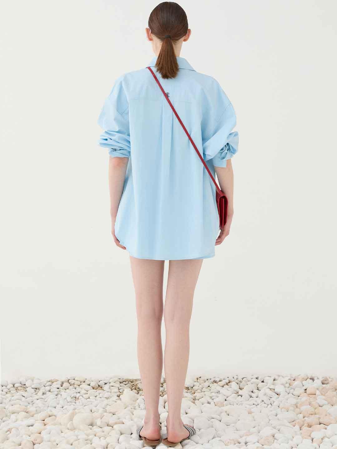 Eleh camicia celeste con ricamo sul retro