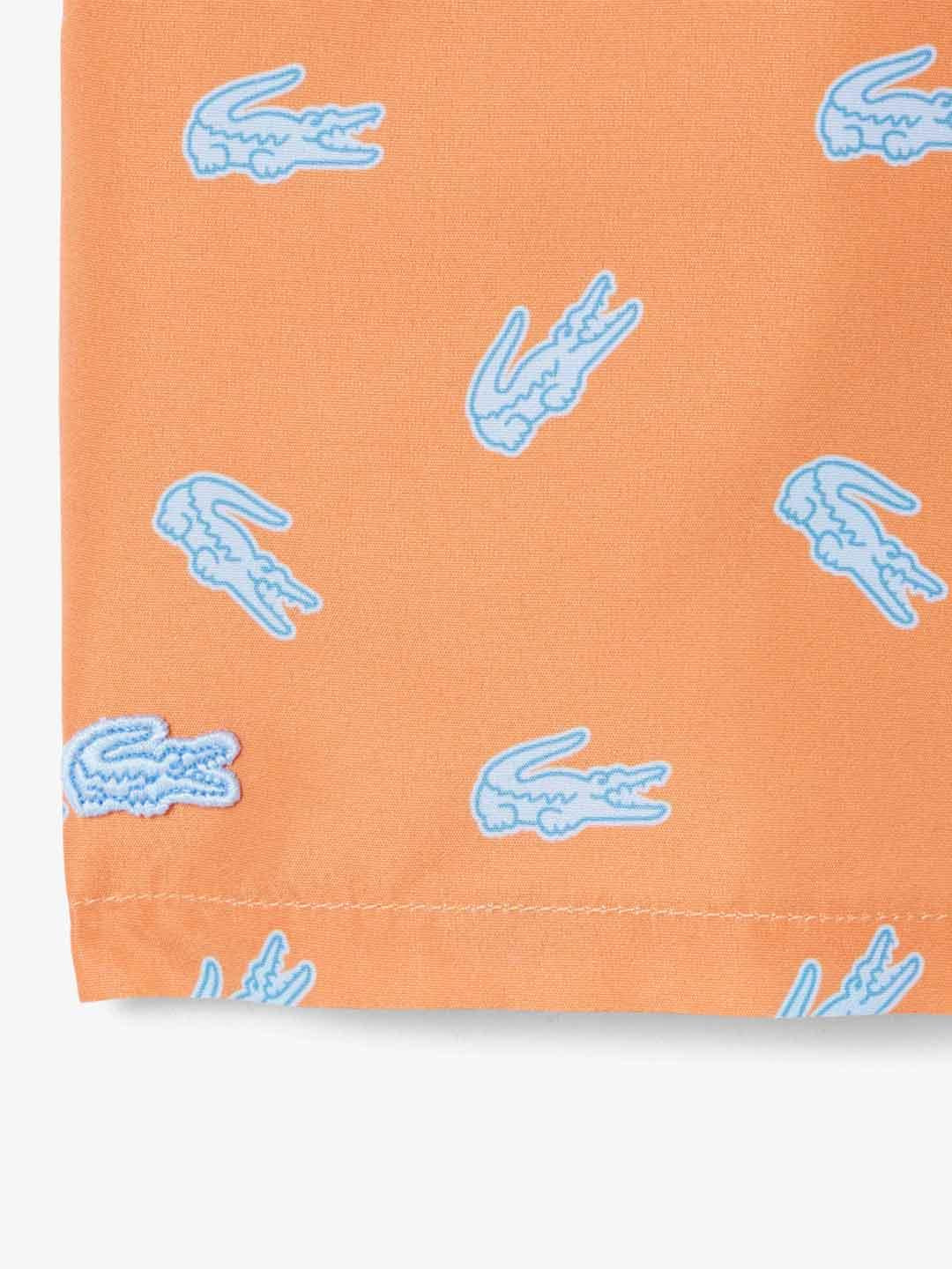Lacoste costume kids arancio con logo celeste