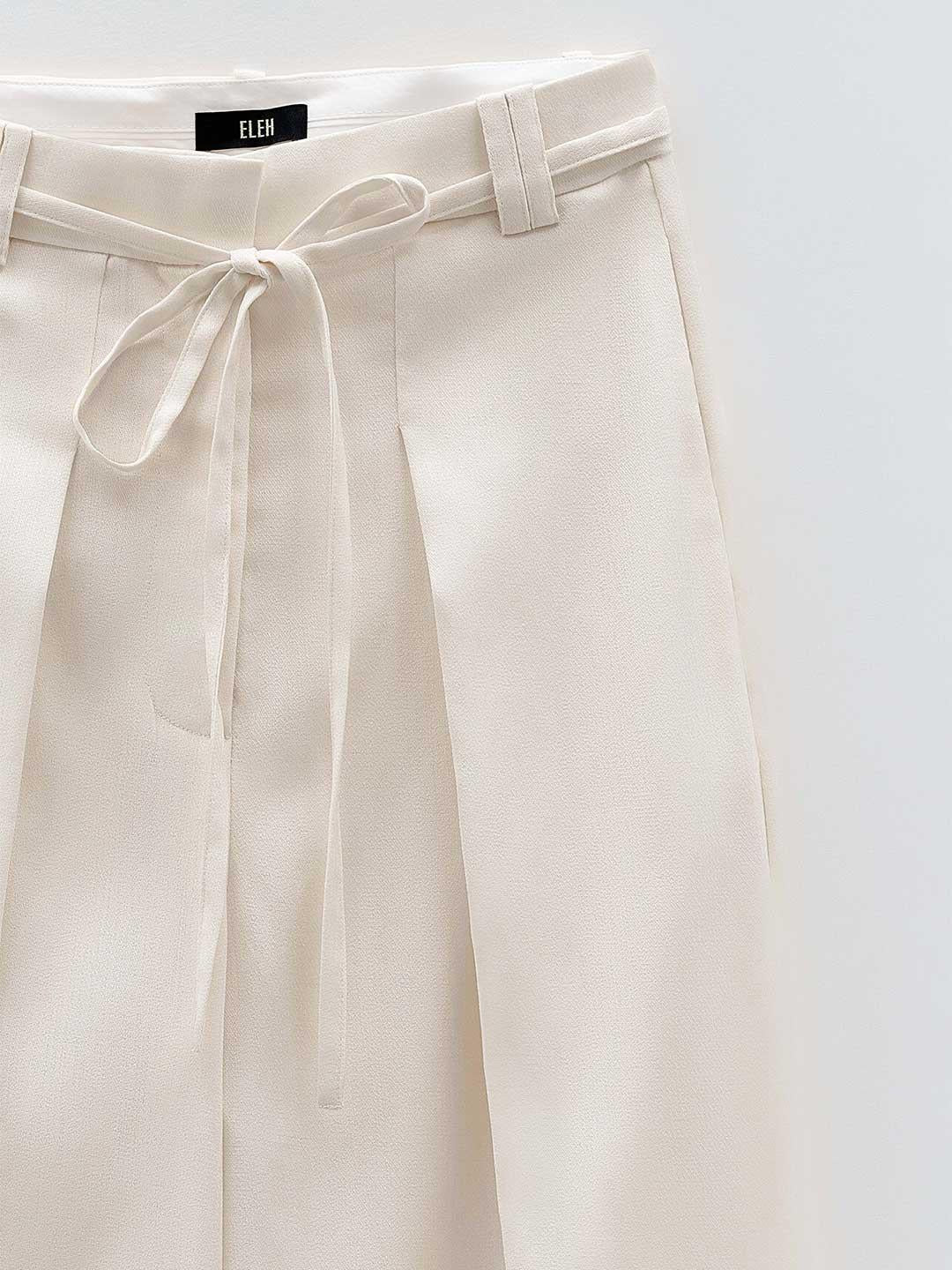 Eleh pantaloni panna con cintura