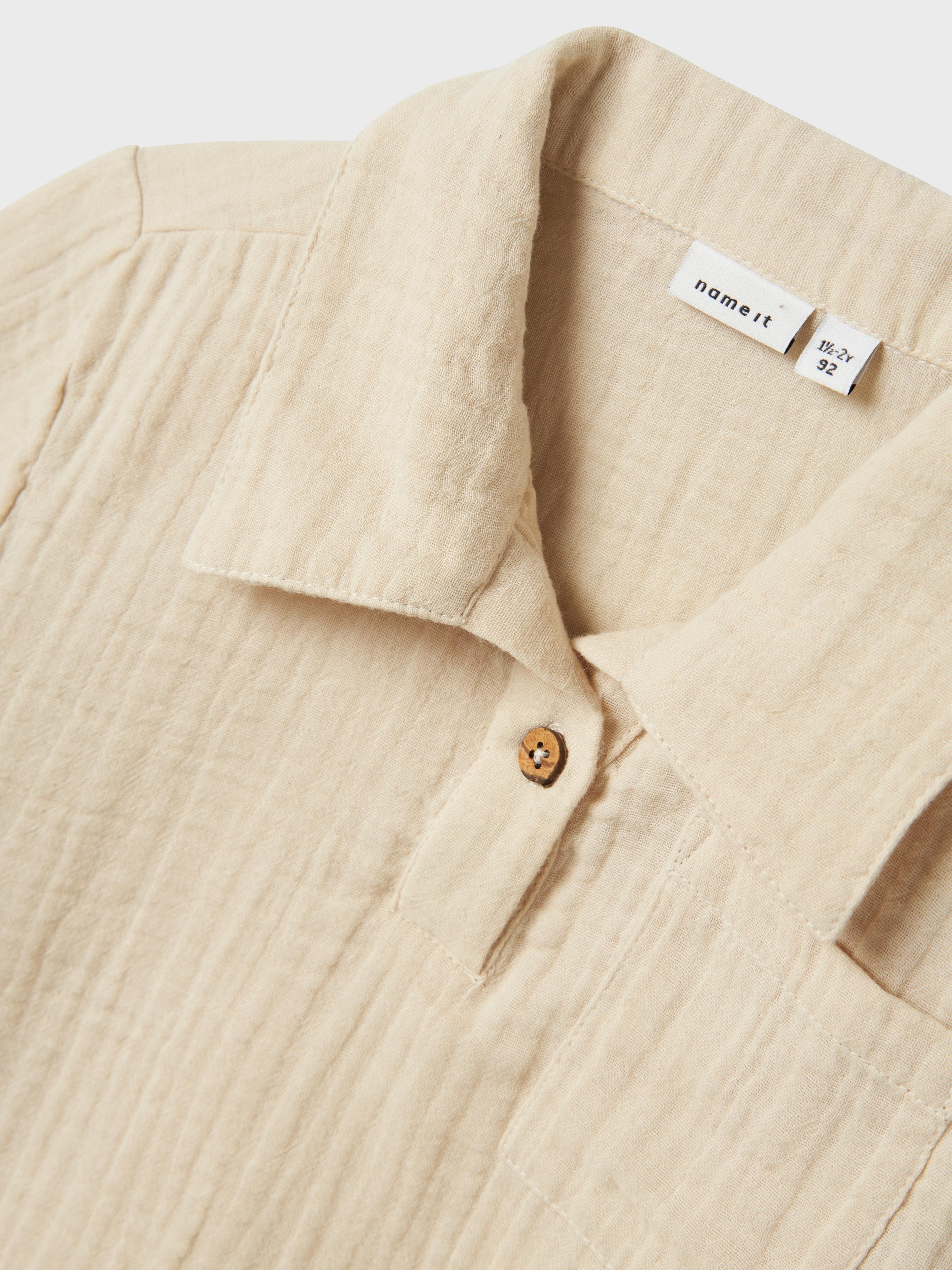 Name It polo kids beige con taschino