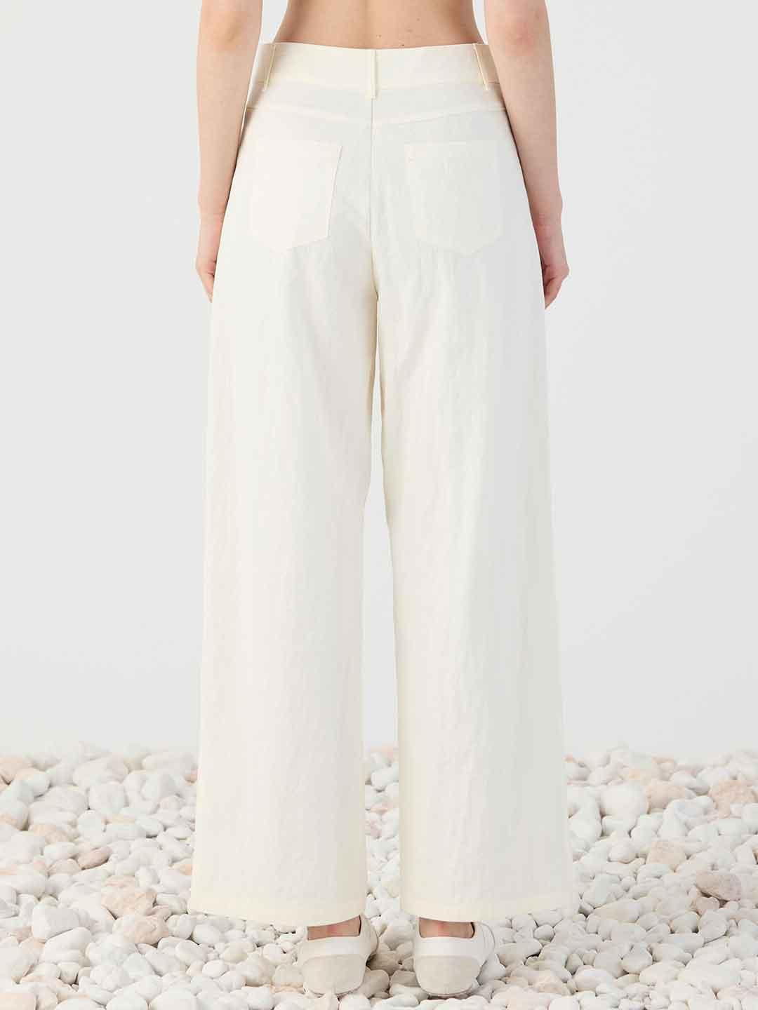 Eleh pantaloni panna con tasche