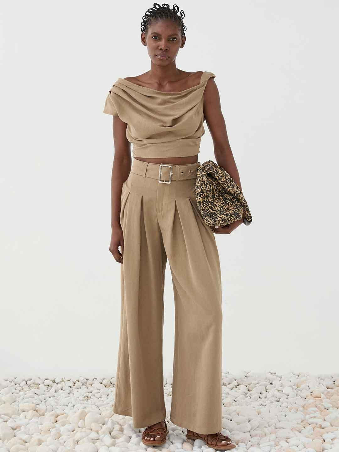 Eleh top beige con zip laterale