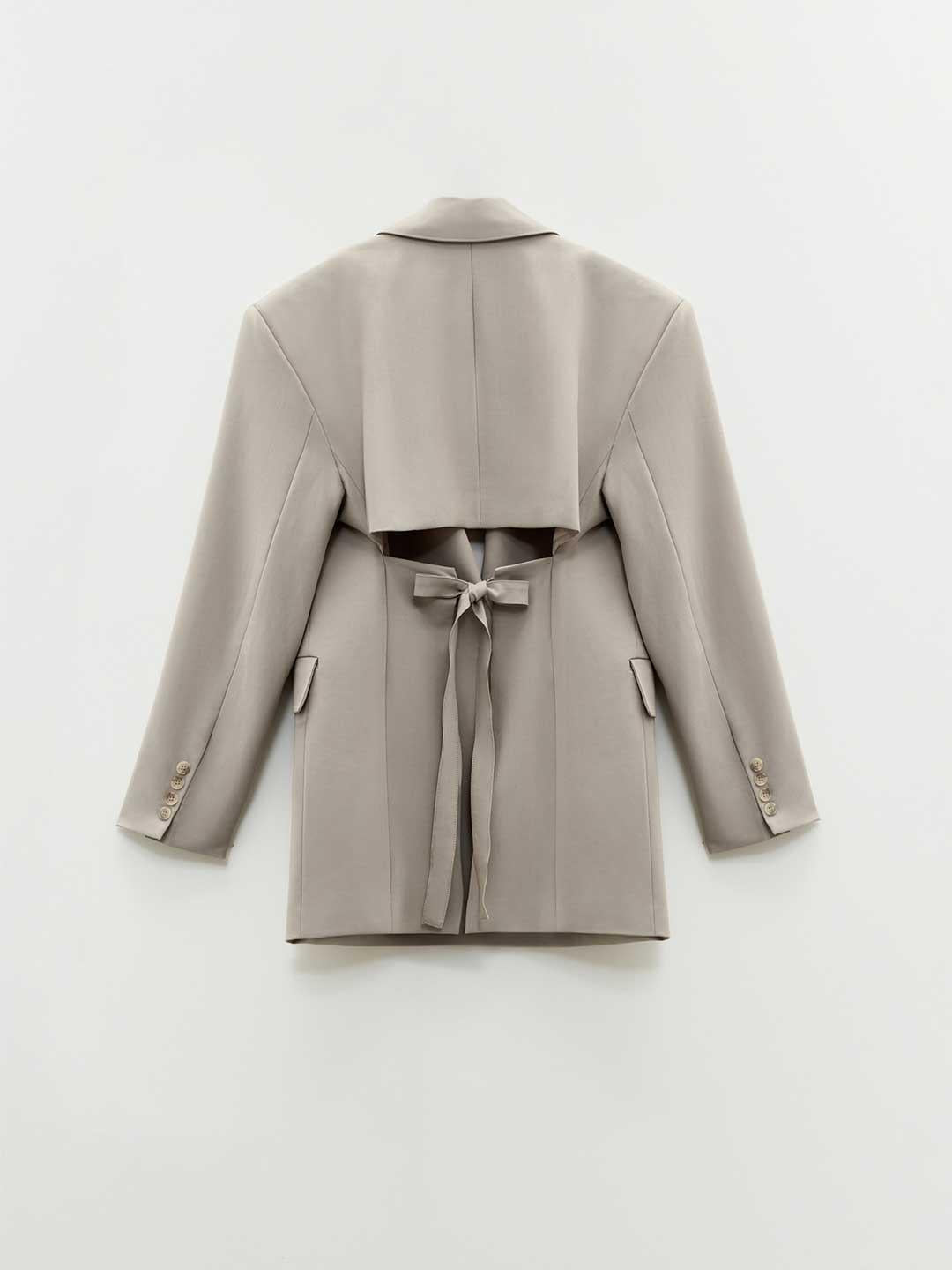 Eleh giacca beige con fiocco