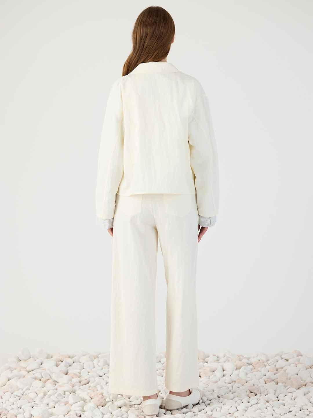 Eleh pantaloni panna con tasche