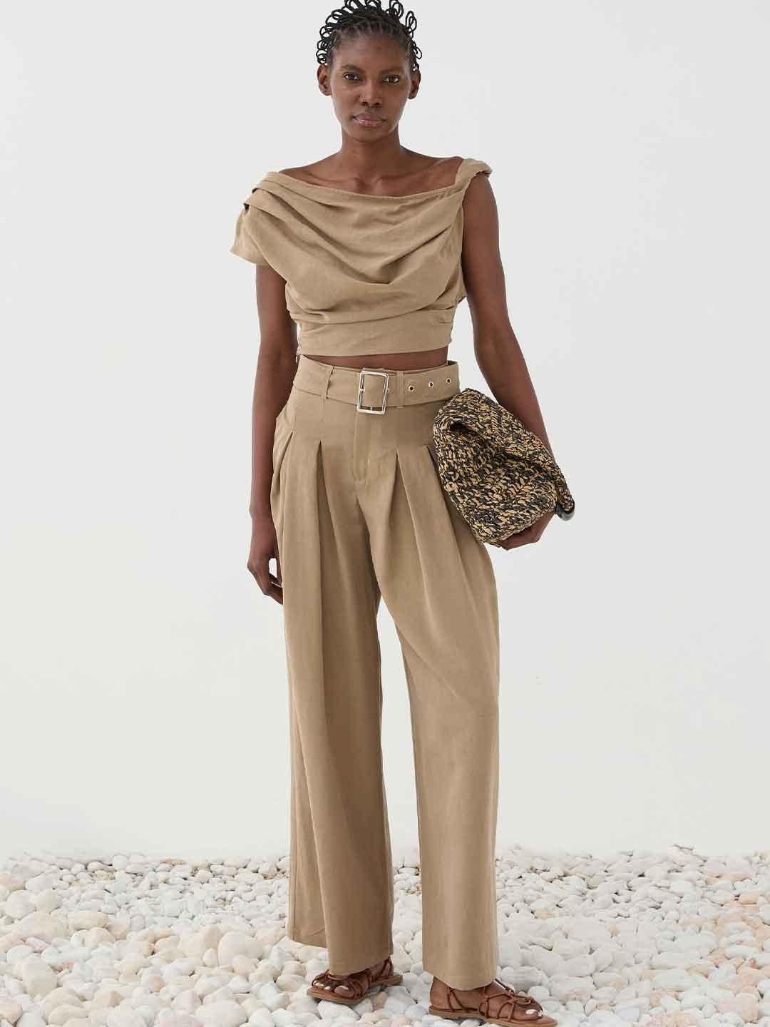 Eleh top beige con zip laterale
