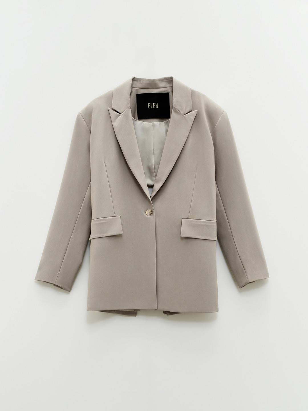 Eleh giacca beige con fiocco