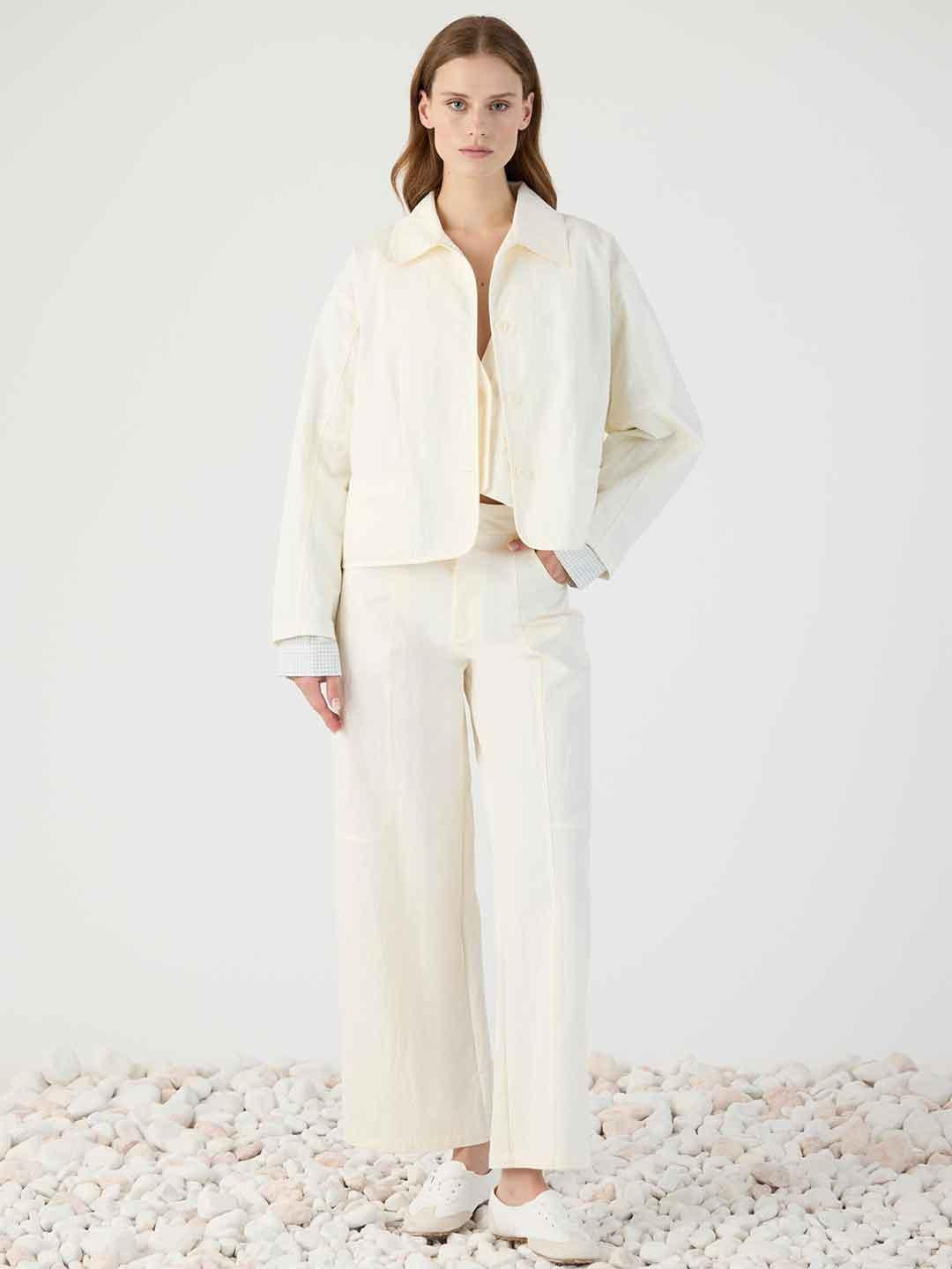Eleh pantaloni panna con tasche