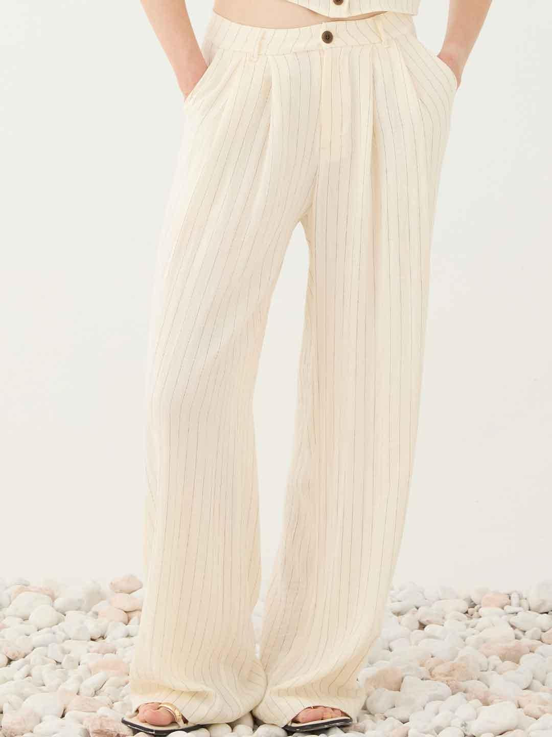 Eleh pantaloni panna con righe nere