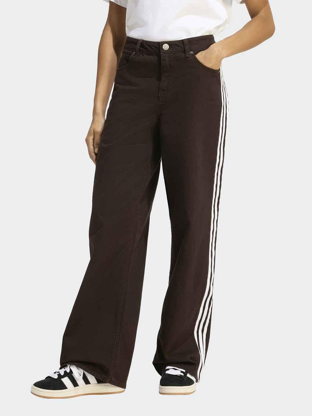 Adidas jeans marorne con bande bianche