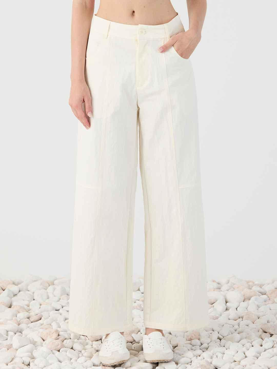 Eleh pantaloni panna con tasche